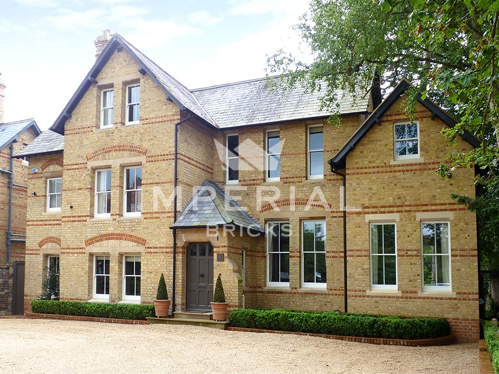 Front of large home extension built with Cambridge Buff handmade bricks.