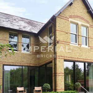 Large residential extension and remodel of a detached home, built using Cambridge Buff handmade bricks.