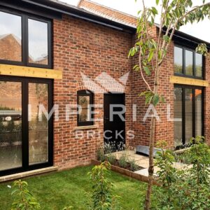 Front of a large semi-detached new build home, built using Urban Weathered handmade bricks.